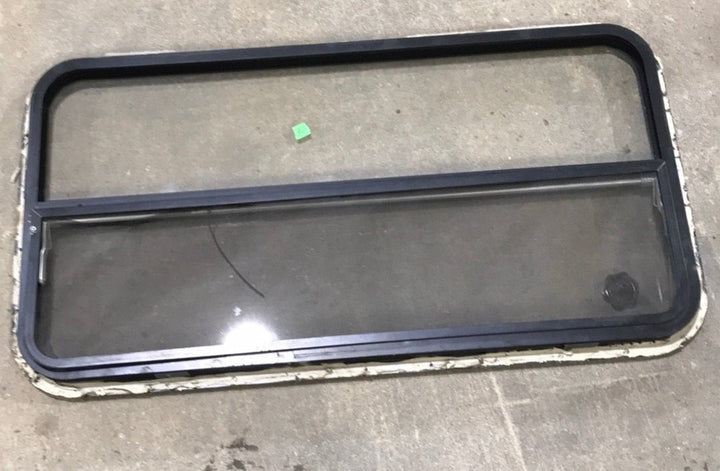 USED Black Radius Opening Window : 42 1/2" W x 22 1/2" H x 2" D - Young Farts RV Parts