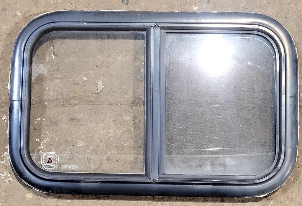 Used Black Radius Opening Window : 23 1/4" W x 14 1/4" H x 1 1/4" D