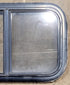 Used Black Radius Opening Window : 23 1/4" W x 14 1/4" H x 1 1/4" D - Young Farts RV Parts
