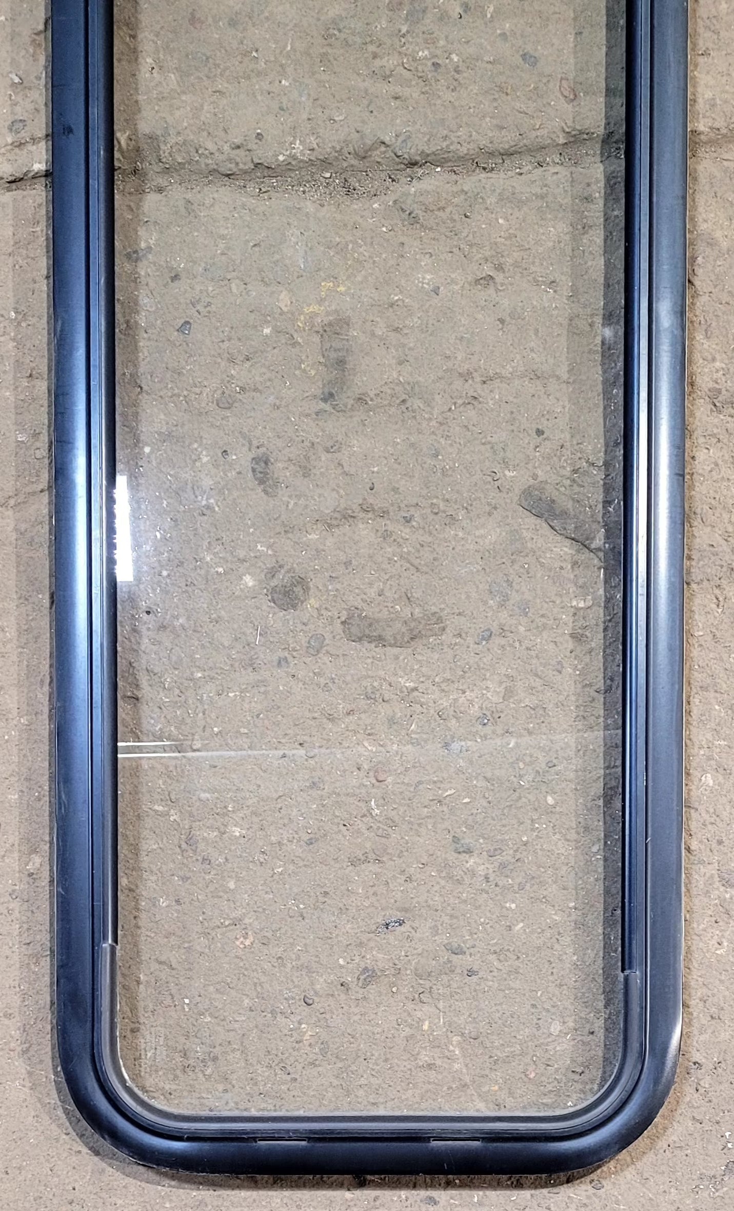 Used Black Radius Non Opening Window : 17 1/4" W x 47 1/4" H x 1" D - Young Farts RV Parts