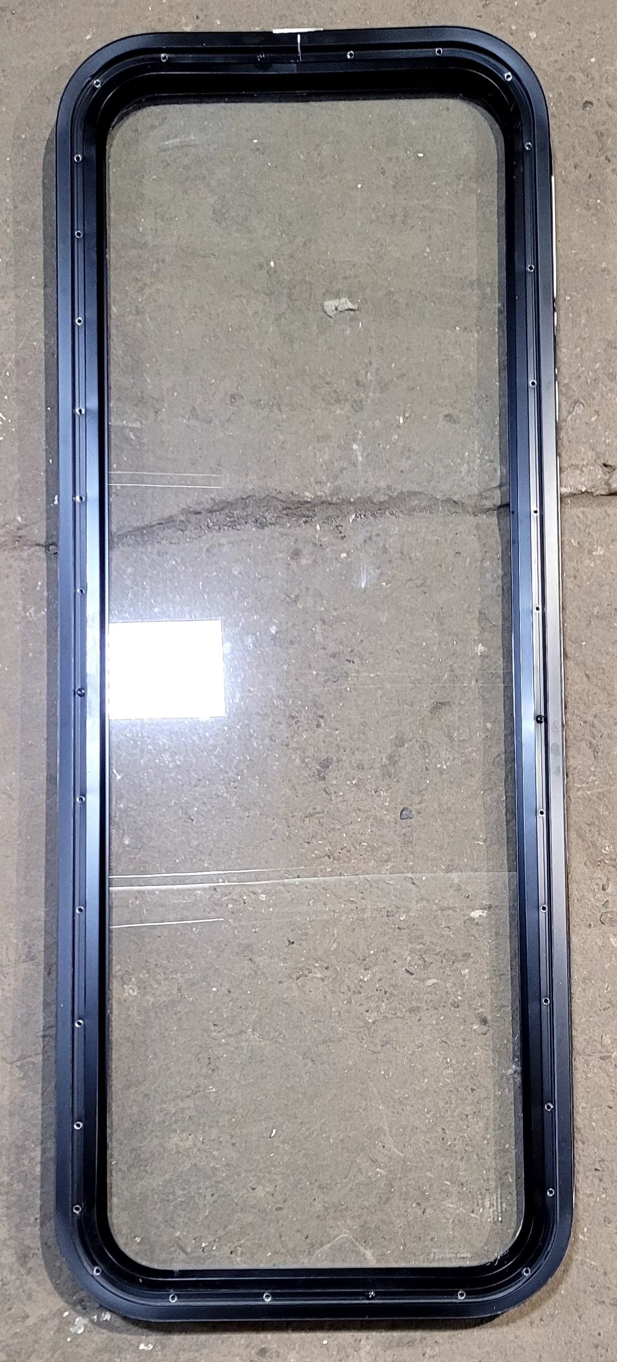 Used Black Radius Non Opening Window : 17 1/4" W x 47 1/4" H x 1" D - Young Farts RV Parts