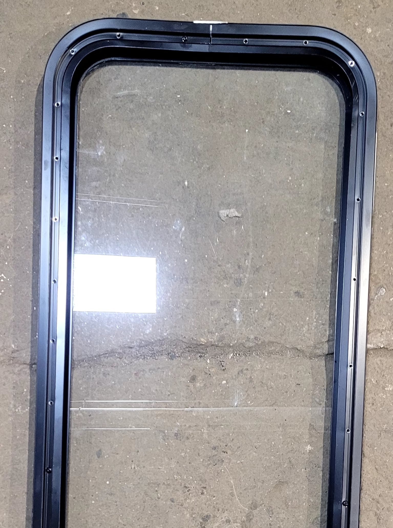 Used Black Radius Non Opening Window : 17 1/4" W x 47 1/4" H x 1" D - Young Farts RV Parts