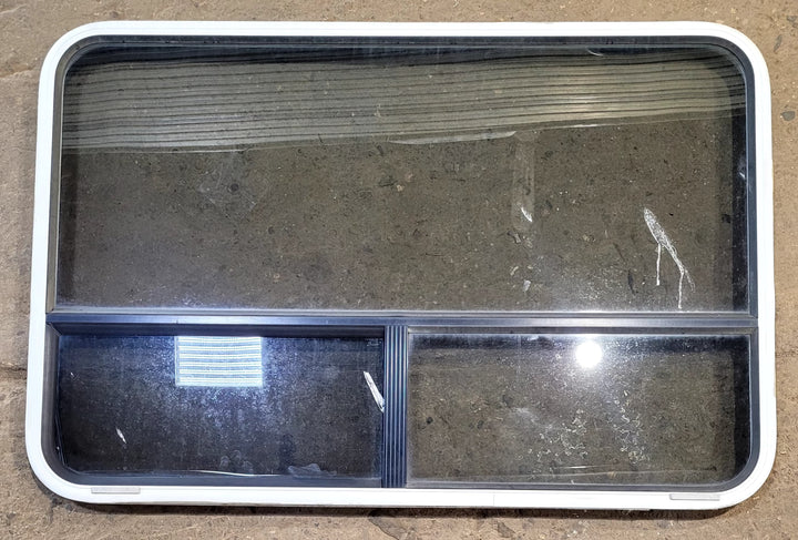 Used White Radius Opening Window : 48 1/4" W x 31 3/4" H x 1 3/4" D - Young Farts RV Parts