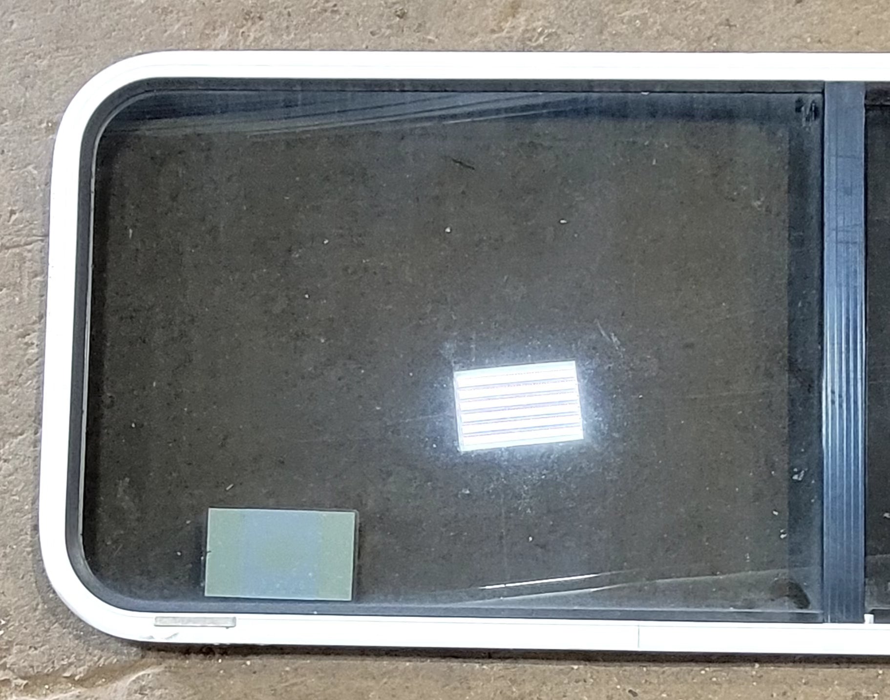 Used White Radius Opening Window : 60 1/4" W x 21 3/4" H x 1 3/4" D - Young Farts RV Parts