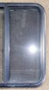 Used Black Radius Opening Window : 29 1/4" W x 27 1/4" H x 1 1/4" D - Young Farts RV Parts