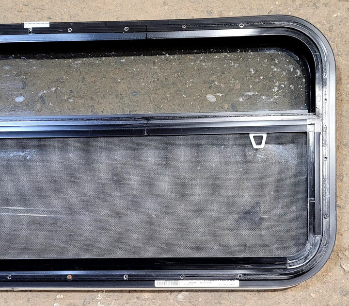 Used Black Radius Opening Window : 41 1/4" W x 17 1/4" H x 1 1/8" D - Young Farts RV Parts