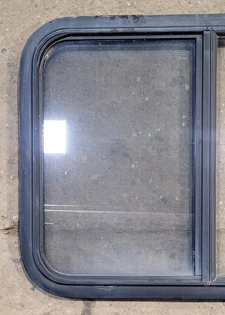 Used Black Radius Opening Window : 29 1/4" W x 21 1/4" H x 1 1/4" D - Young Farts RV Parts