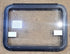 Used Black Radius Emergency Opening Window : 29 1/2" W x 21 1/2" H x 1 1/8" D - Young Farts RV Parts