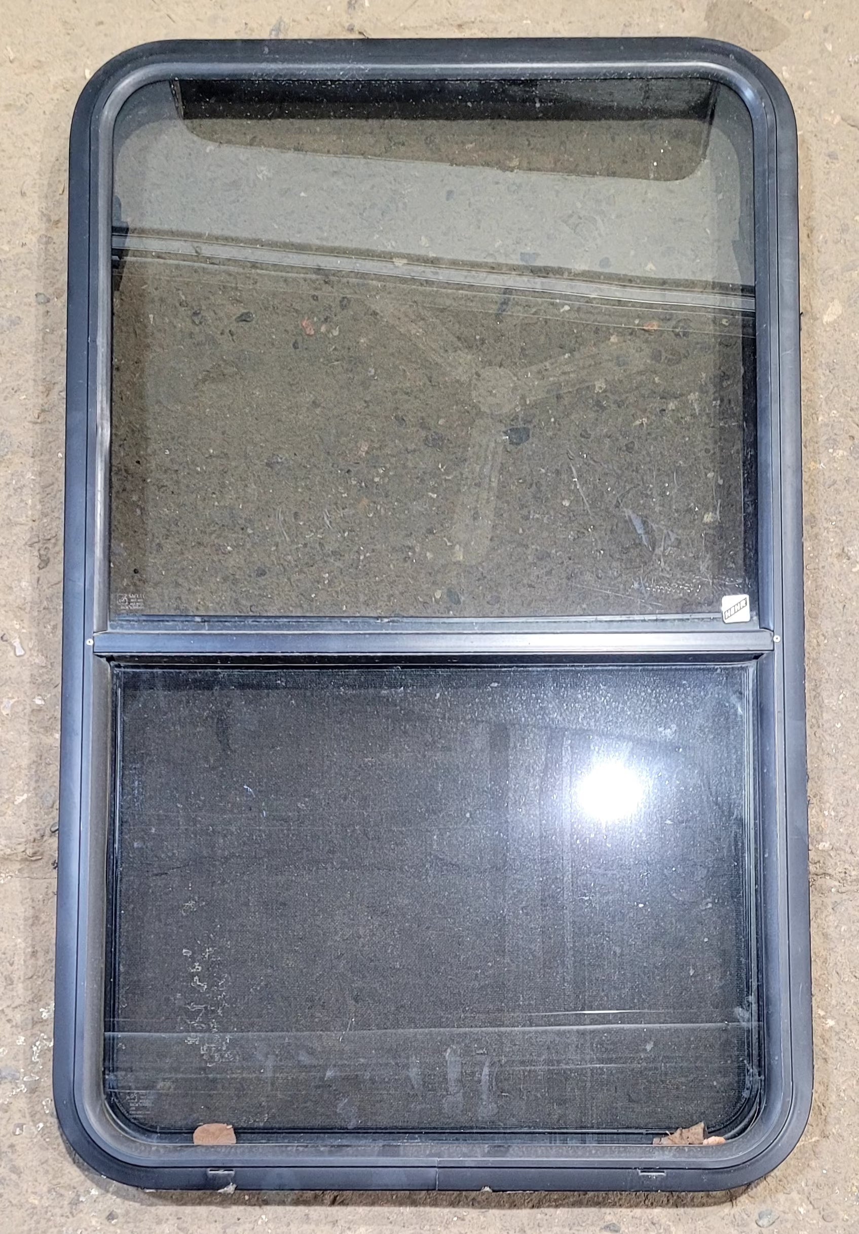 Used Black Radius Opening Window : 25 3/4" W x 41 3/4" H x 1 7/8" D - Young Farts RV Parts