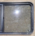 Used Black Radius Opening Window : 47 3/4" W x 23 3/4" H x 1 7/8" D - Young Farts RV Parts
