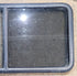 Used Black Radius Opening Window : 47 3/4" W x 23 3/4" H x 1 7/8" D - Young Farts RV Parts