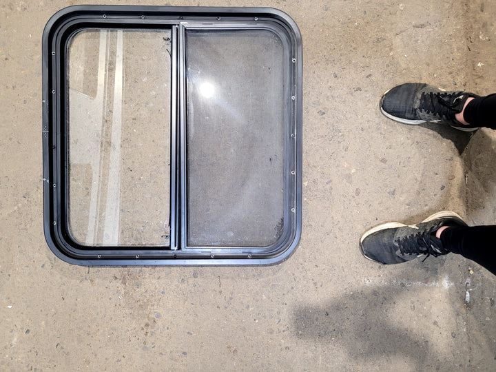 Used Black Radius Opening Window : 25 1/2" W x 25 1/2" H x 1 3/4" D - Young Farts RV Parts