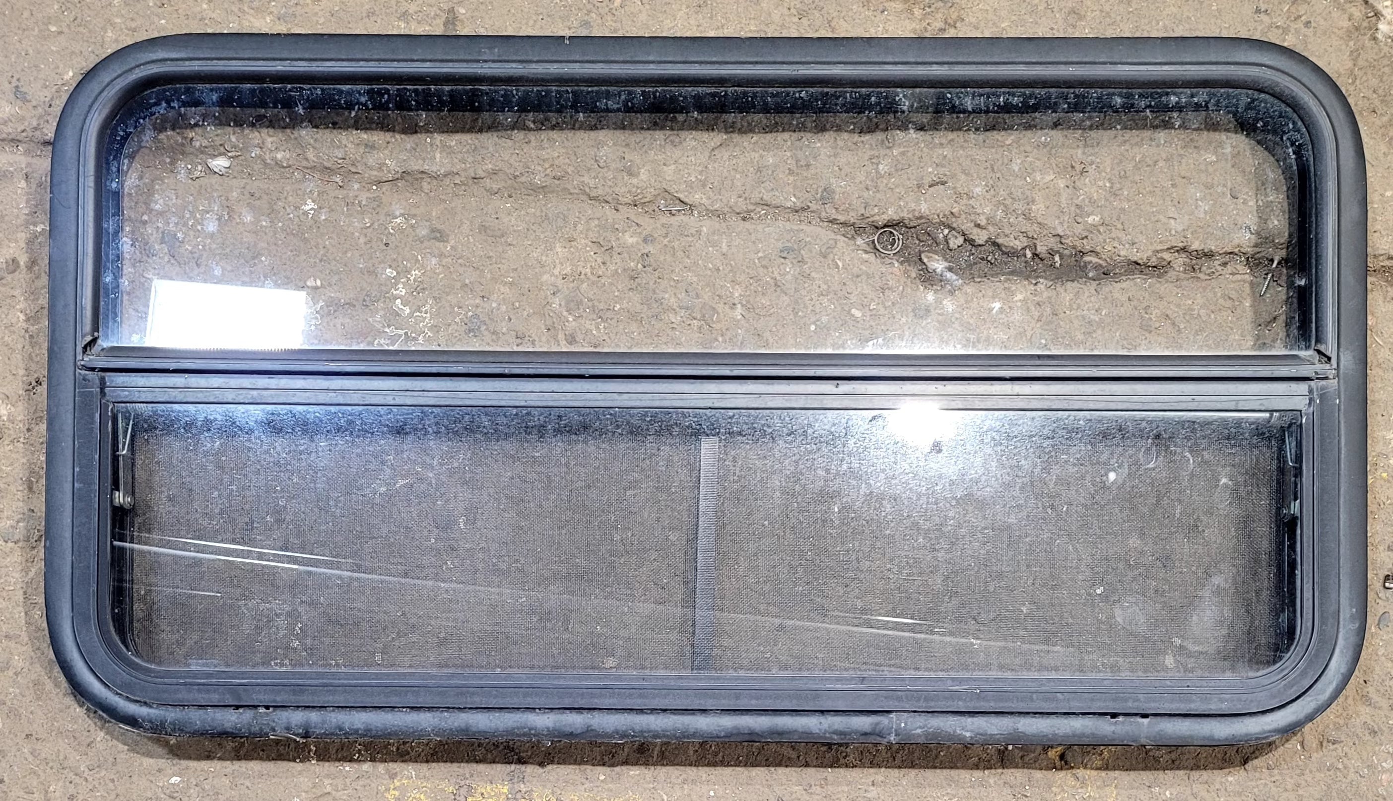 Used Black Radius Opening Window : 41 1/4" W x 21 1/4" H x 1 3/4" D - Young Farts RV Parts