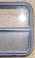 Used Black Radius Opening Window : 23 1/2" W x 21 1/4" H x 1 1/4" D - Young Farts RV Parts