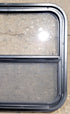 Used Black Radius Opening Window : 23 1/2" W x 21 1/4" H x 1 1/4" D - Young Farts RV Parts