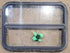 Used Black Radius Opening Window : 29 1/2" W x 21 1/4" H x 1 1/2" D - Young Farts RV Parts