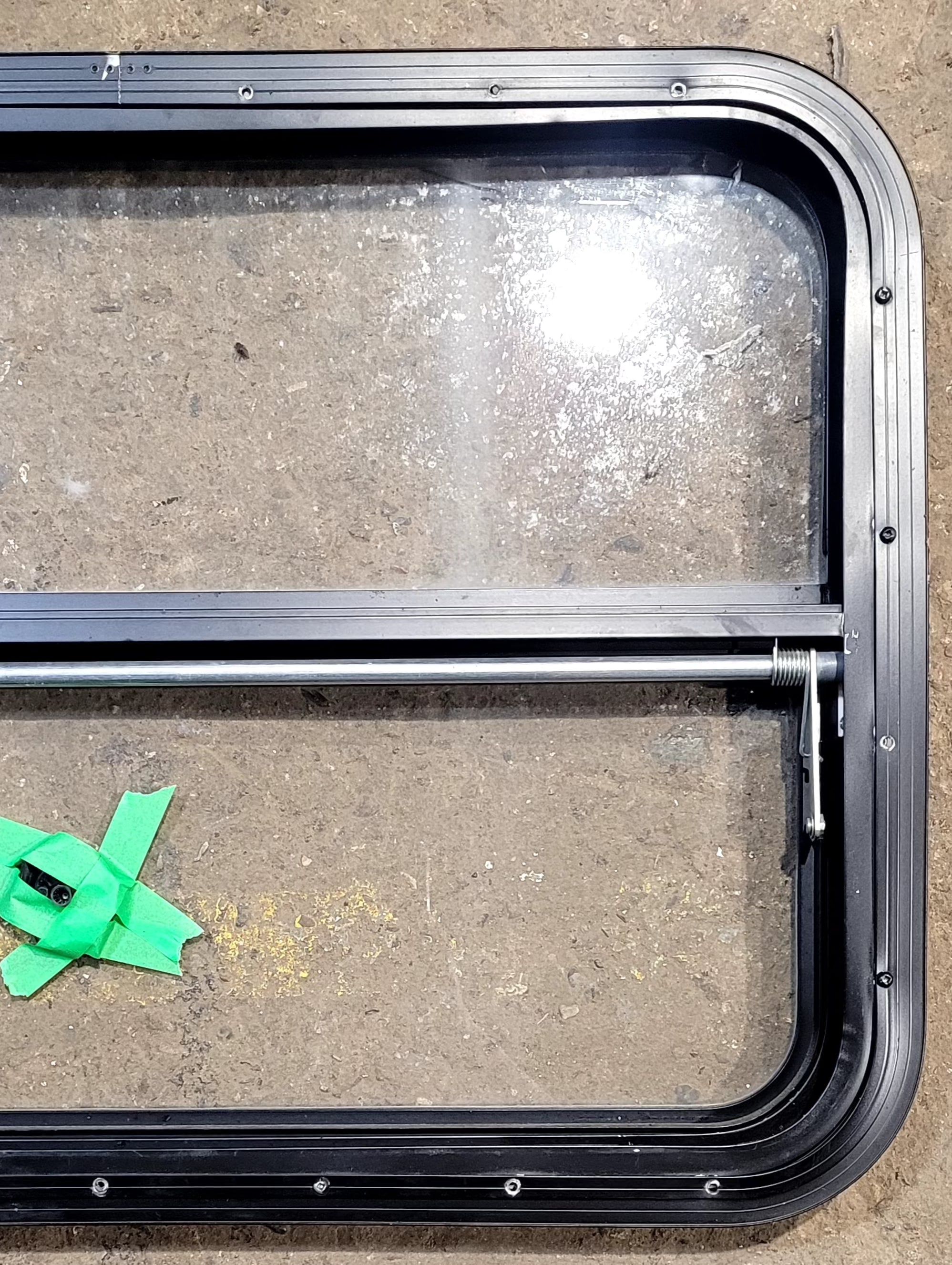 Used Black Radius Opening Window : 29 1/2" W x 21 1/4" H x 1 1/2" D - Young Farts RV Parts