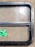 Used Black Radius Opening Window : 29 1/2" W x 21 1/4" H x 1 1/2" D - Young Farts RV Parts