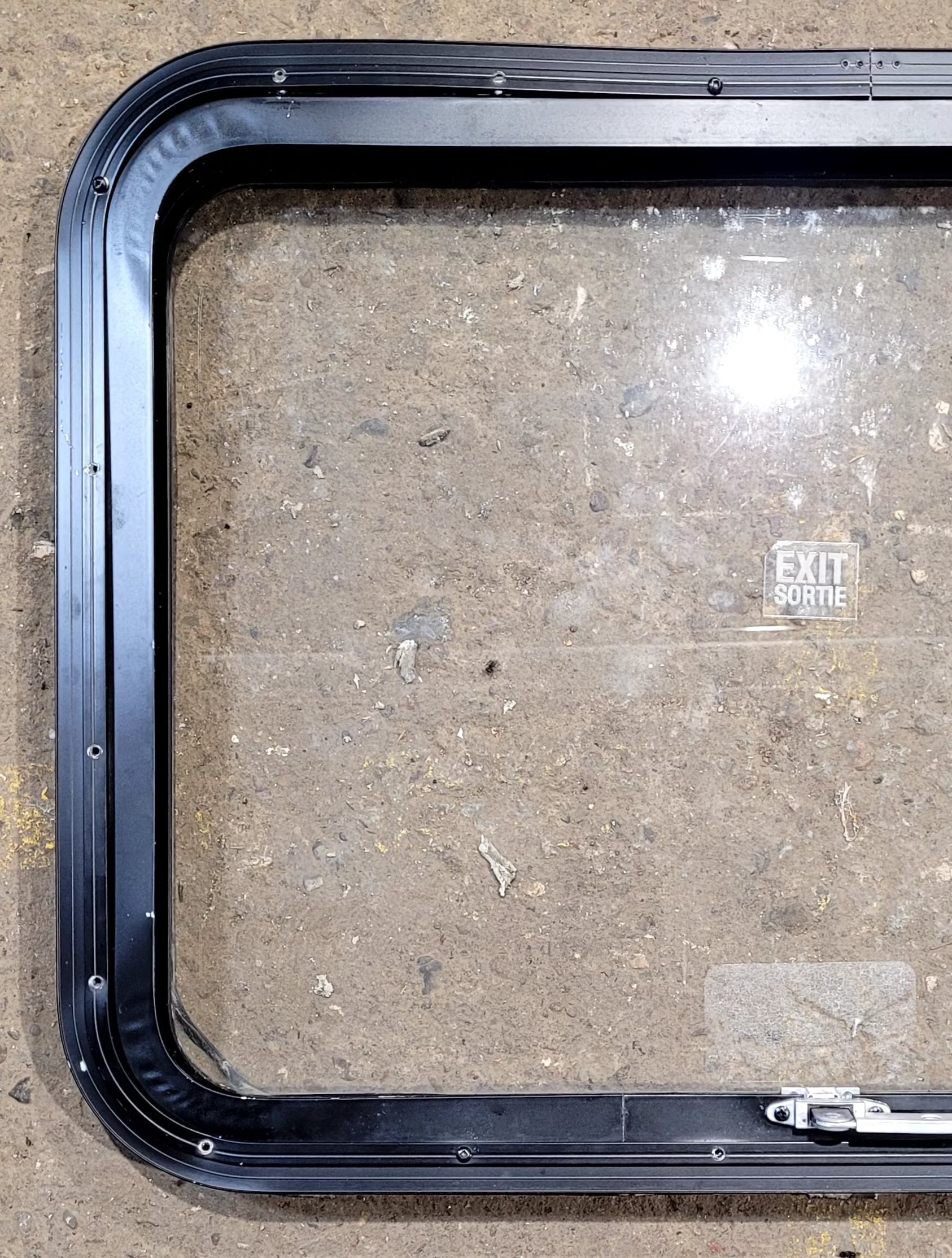 Used Black Radius Emergency Opening Window : 29 1/2" W x 21 1/2" H x 1 5/8" D - Young Farts RV Parts