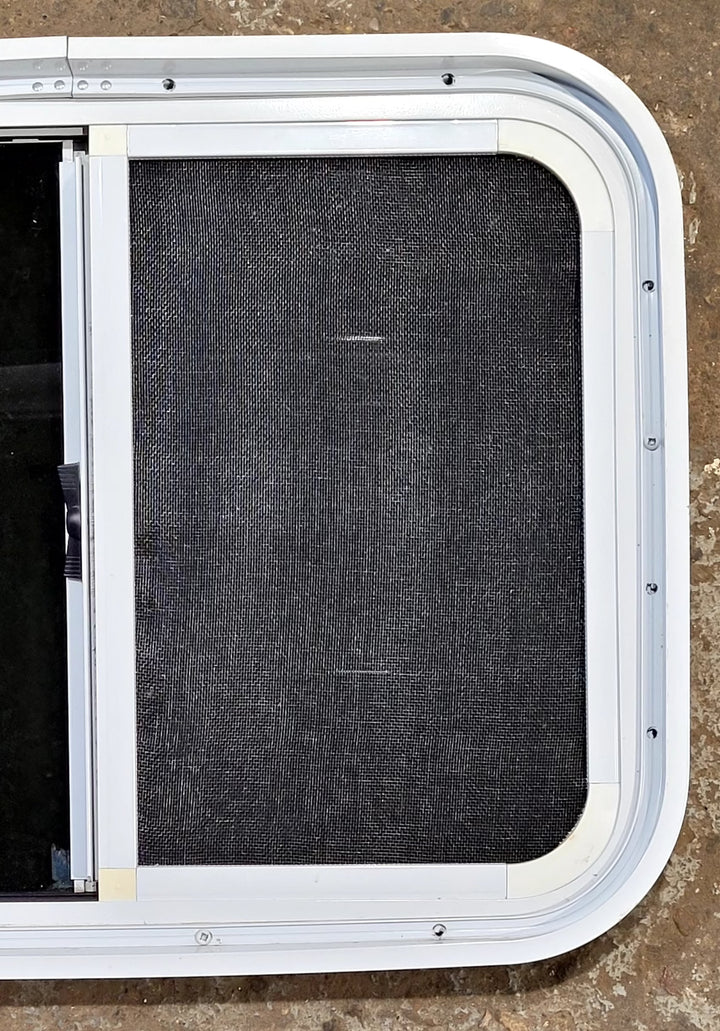 Used White Radius Opening Window : 23 1/2" W x 17 1/2" H x 1 3/4" D - Young Farts RV Parts
