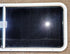 Used White Radius Emergency Opening Window : 59 1/2" W x 21 1/2" H x 1 3/4" D - Young Farts RV Parts