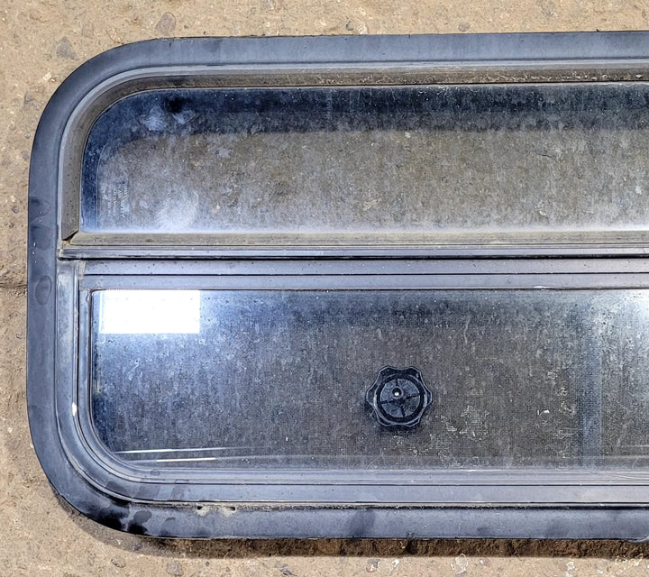 Used Black Radius Opening Window : 35 1/4" W x 14 1/4" H x 2" D - Young Farts RV Parts