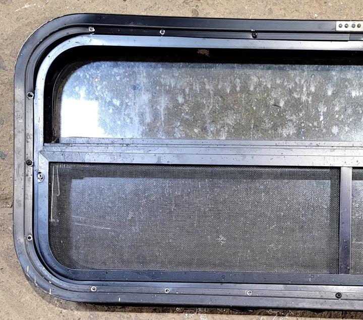 Used Black Radius Opening Window : 35 1/4" W x 14 1/4" H x 2" D - Young Farts RV Parts