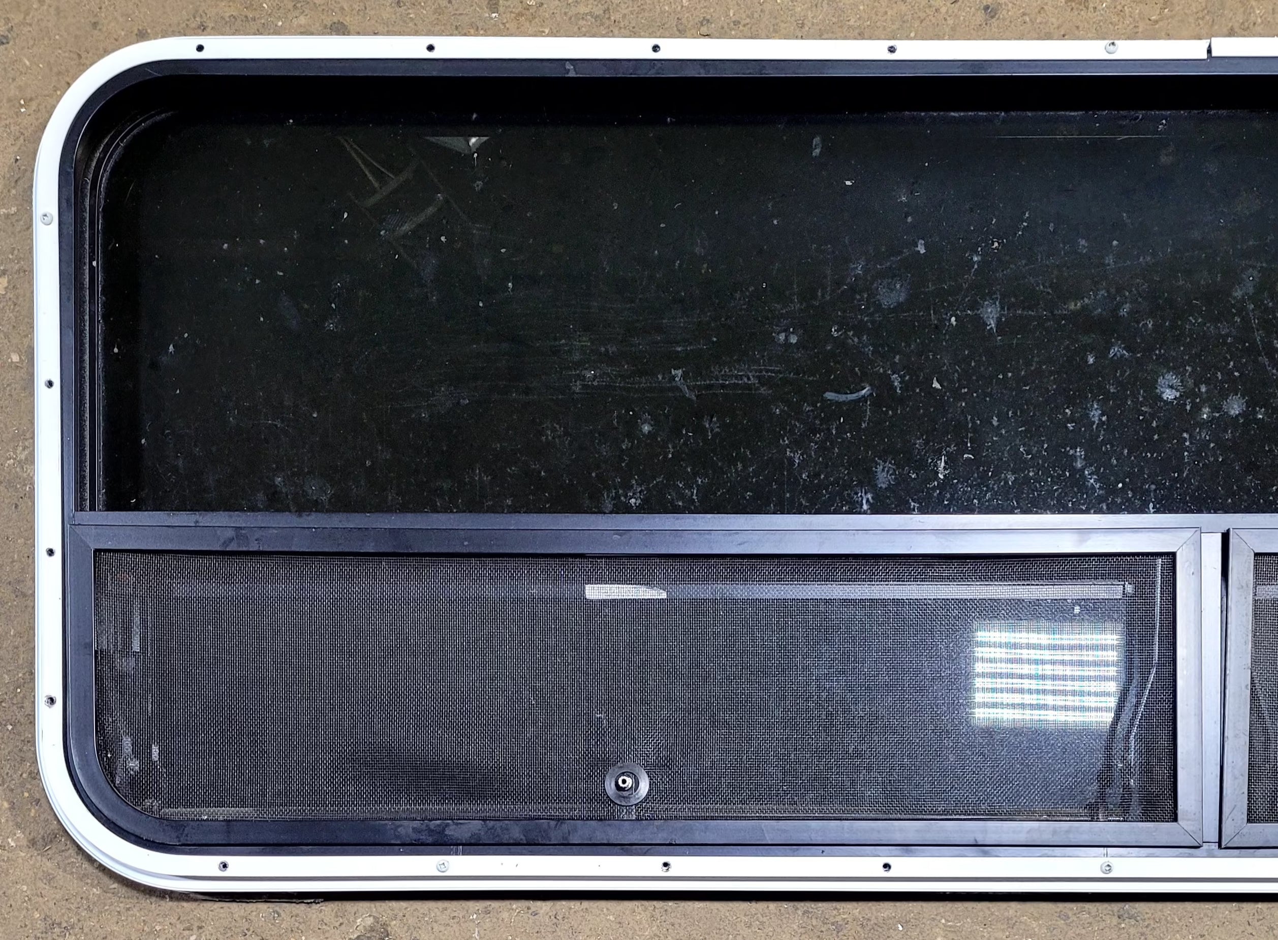 Used Black Radius Opening Window : 57 1/2" W x 20 1/4" H x 1" D - Young Farts RV Parts