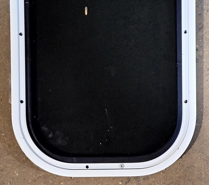 Used Black Radius Non Opening Window : 11 1/4" W x 18 1/4" H x 1" D - Young Farts RV Parts