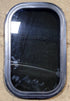 Used Black Radius Non Opening Window : 11 1/4" W x 18 1/4" H x 1" D - Young Farts RV Parts