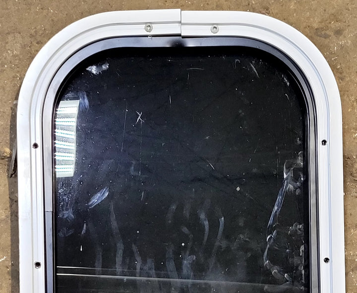 Used Black Radius Non Opening Window : 11 1/4" W x 18 1/4" H x 1" D - Young Farts RV Parts