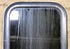Used Black Radius Non Opening Window : 14 3/4" W x 18 1/4" H x 1 1/8" D - Young Farts RV Parts