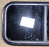 Used Black Radius Opening Window : 31 1/2" W x 15 1/4" H x 1 1/8" D - Young Farts RV Parts