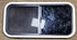 Used Black Radius Opening Window : 31 1/2" W x 15 1/4" H x 1 1/8" D - Young Farts RV Parts