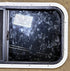 Used Black Radius Opening Window : 31 1/2" W x 15 1/4" H x 1 1/8" D - Young Farts RV Parts