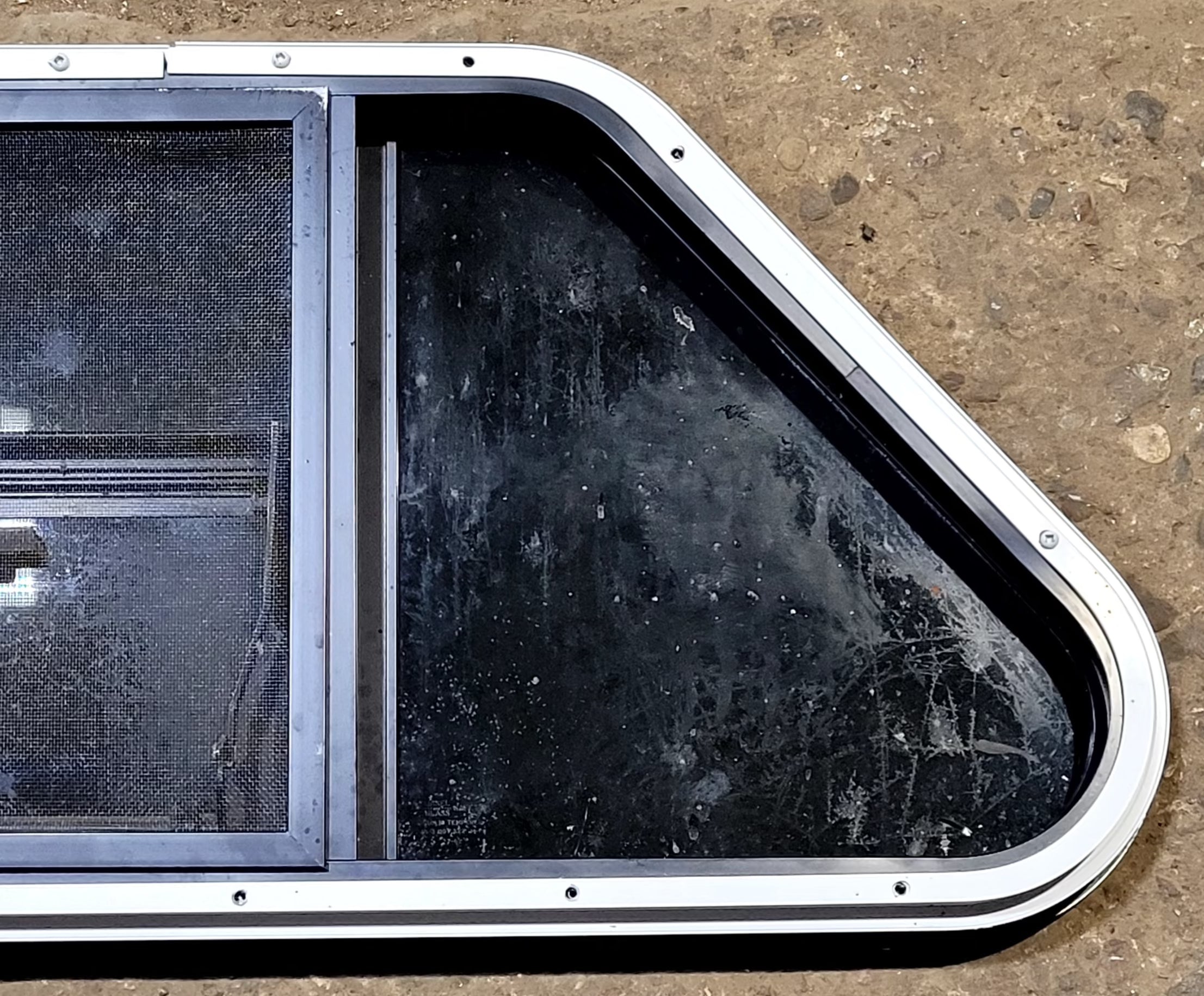 Used Slanted Black Radius Opening Window : 35 1/2" W x 14 3/4" H x 1 1/8" D - Young Farts RV Parts