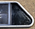 Used Slanted Black Radius Opening Window : 35 1/2" W x 14 3/4" H x 1 1/8" D - Young Farts RV Parts