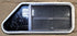 Used Slanted Black Radius Opening Window : 35 1/2" W x 14 3/4" H x 1 1/8" D - Young Farts RV Parts