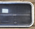 Used Slanted Black Radius Opening Window : 35 1/2" W x 14 3/4" H x 1 1/8" D - Young Farts RV Parts