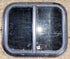 Used Black Radius Opening Window : 17 1/2" W x 14 1/4" H x 1 1/4" D - Young Farts RV Parts