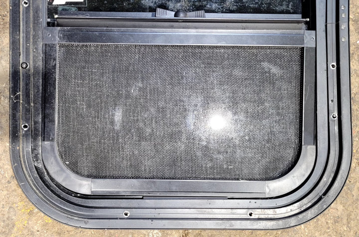 Used Black Radius Opening Window : 17 1/2" W x 14 1/4" H x 1 1/4" D - Young Farts RV Parts