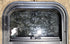 Used Black Radius Opening Window : 17 1/2" W x 14 1/4" H x 1 1/4" D - Young Farts RV Parts