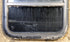 Used Black Radius Opening Window : 17 1/2" W x 21 1/2" H x 1 3/4" D - Young Farts RV Parts