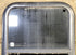 Used Black Radius Opening Window : 17 1/2" W x 21 1/2" H x 1 3/4" D - Young Farts RV Parts