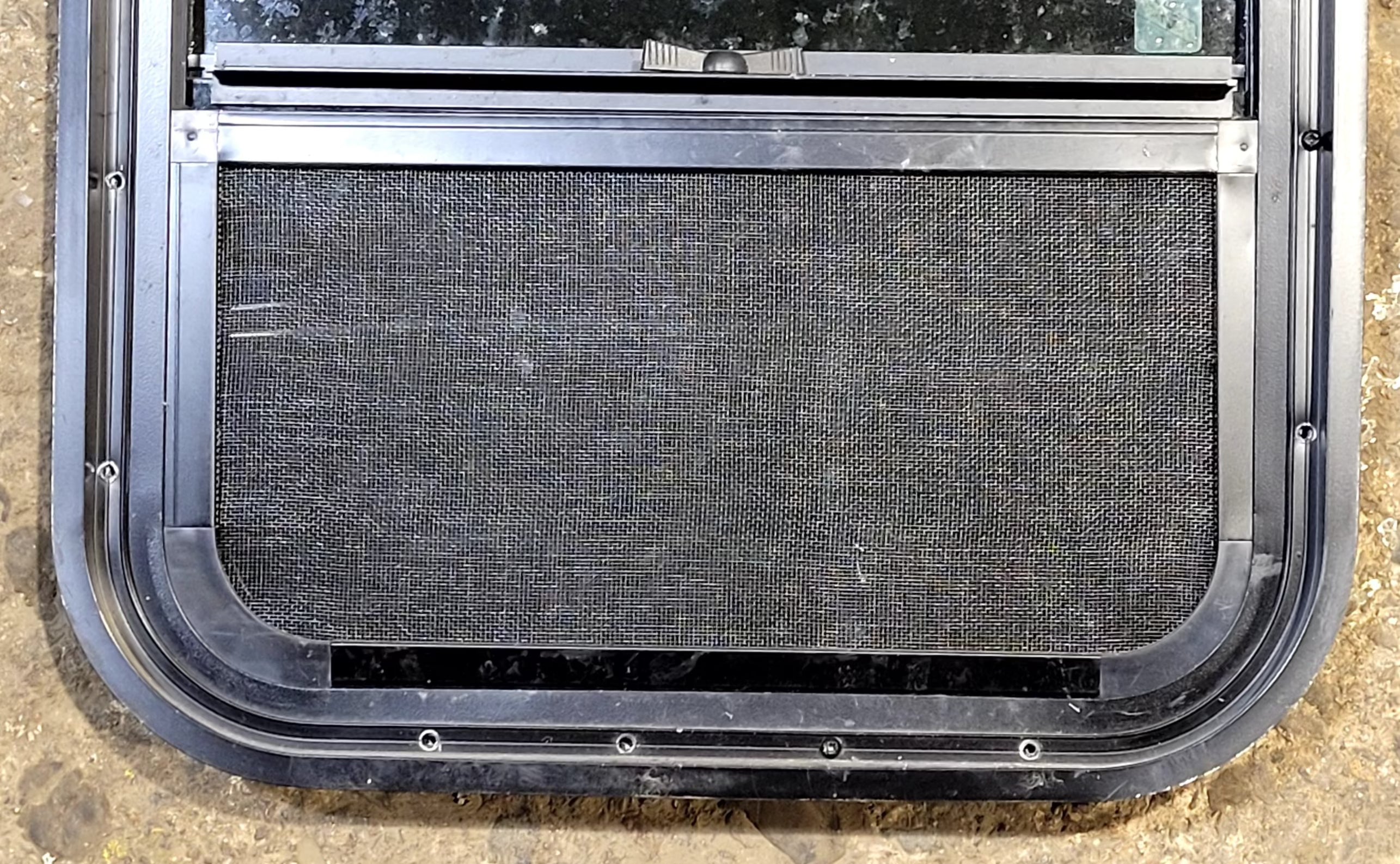 Used Black Radius Opening Window : 17 1/2" W x 21 1/2" H x 1 3/4" D - Young Farts RV Parts