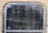 Used Black Radius Opening Window : 17 1/2" W x 21 1/2" H x 1 3/4" D - Young Farts RV Parts