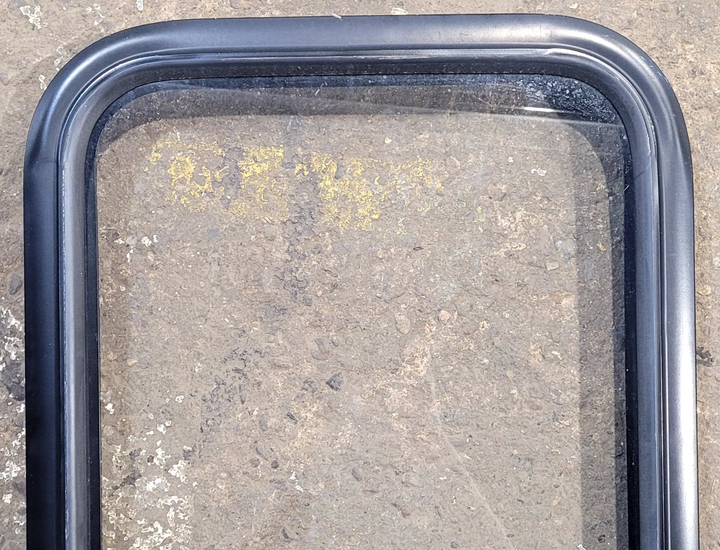 Used Black Radius Non Opening Window : 17 1/4" W x 22 1/4" H x 1 5/8" - Young Farts RV Parts