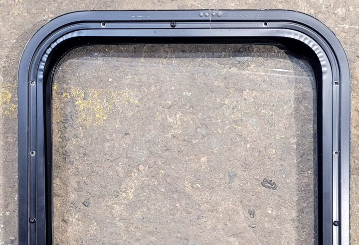 Used Black Radius Non Opening Window : 17 1/4" W x 22 1/4" H x 1 5/8" - Young Farts RV Parts