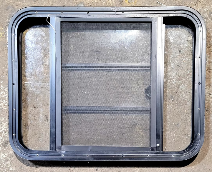 Used Black Radius Opening Window : 29 1/4" W x 22 1/4" H x 1 3/4" - Young Farts RV Parts