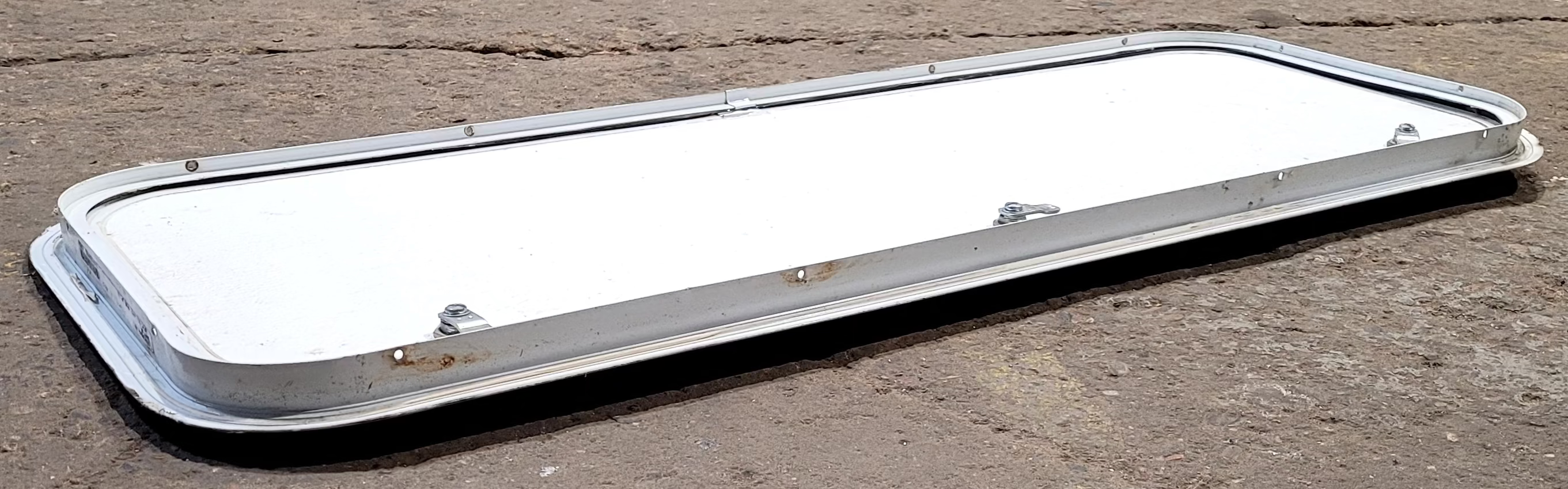 Used Radius Cornered Cargo Door 39 7/8" x 15" x 1"D - Young Farts RV Parts